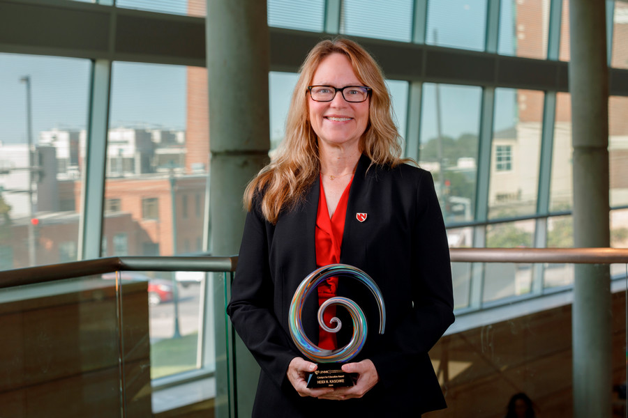 Heidi Kaschke poses with the catalyst award