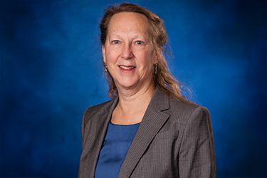 Nancy Krusen poses for a headshot