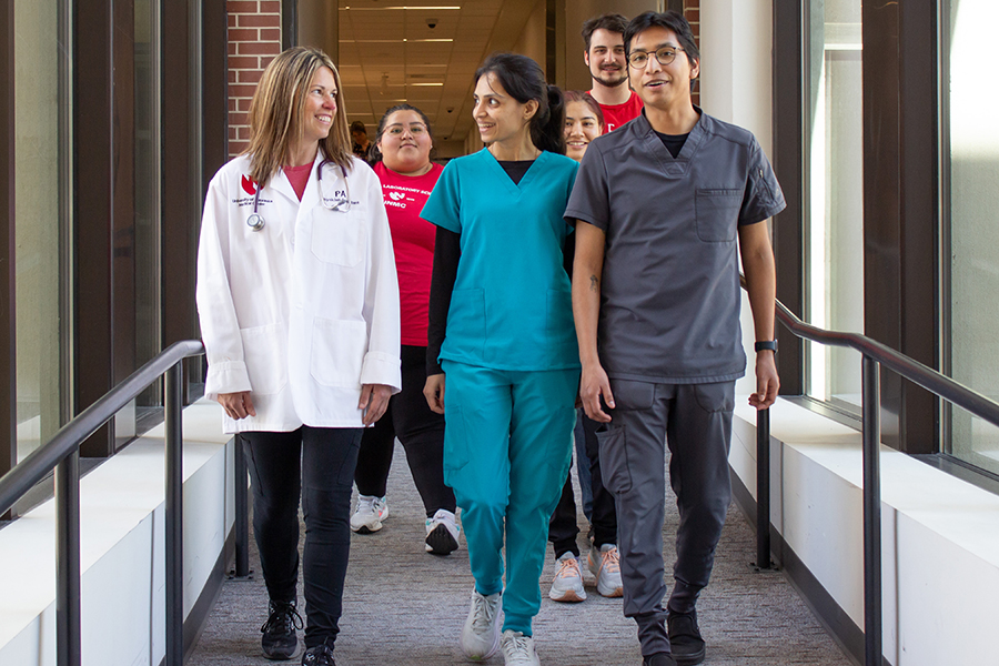 Students walking together on skywalk