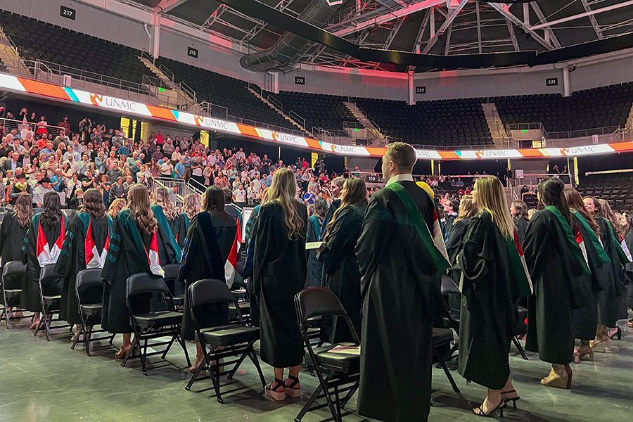 Hooded grads from the back