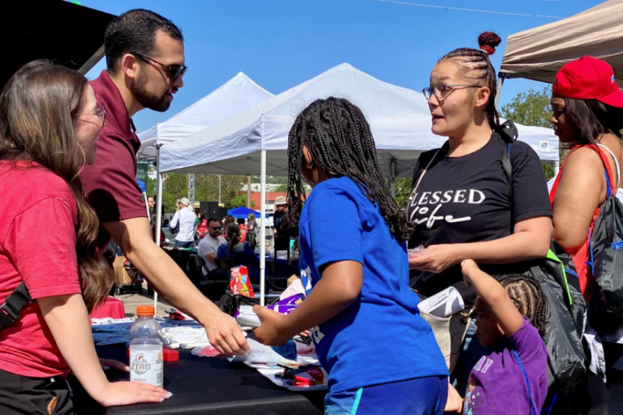 Provider educating and sharing cancer prevention materials with community people