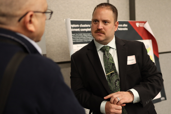 two doctors talking at event