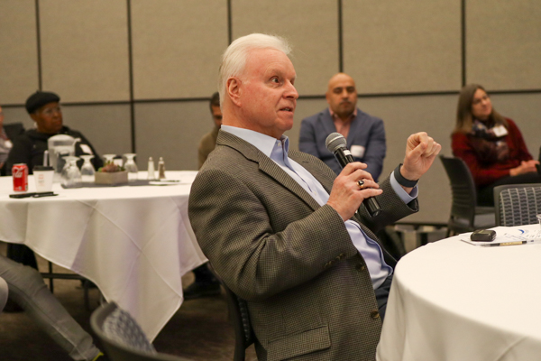 Dr. William Rizzo asking questions of conference speaker