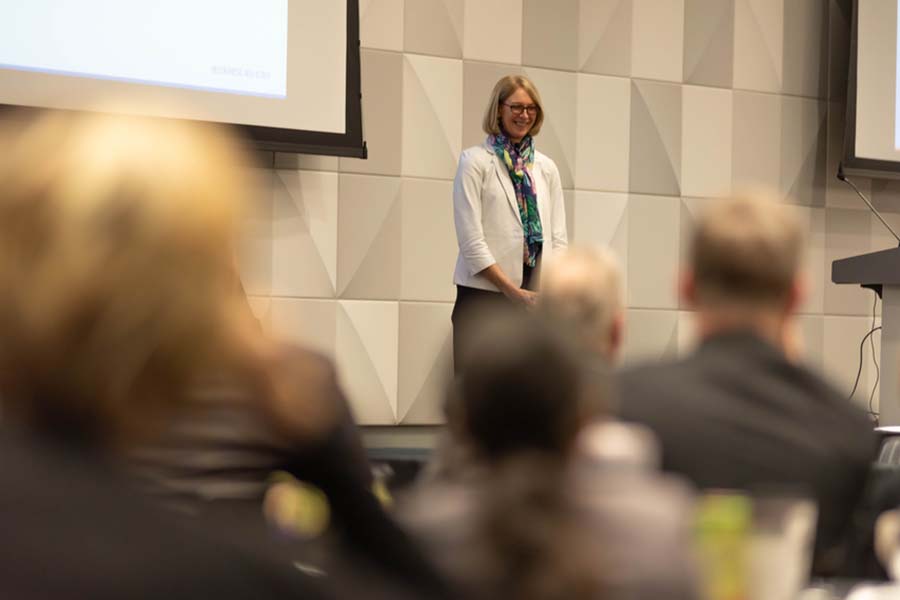 Speaker addressing an audience.