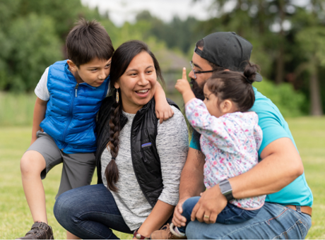 A joyful Native American family.