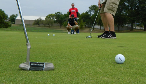Golfers line up their shots at the 2012 tournament.