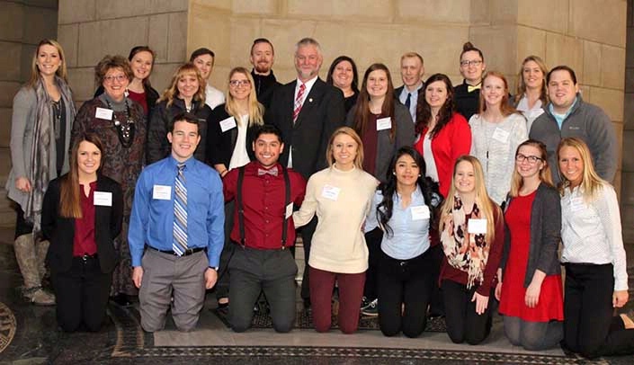 Kearney State Sen. John Lowe, center, with students, alumni and faculty from the UNMC College of Nursing Kearney Division.