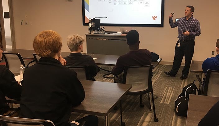 Mike Kozak from the IT department speaks to students during the CAREEROCKIT event.