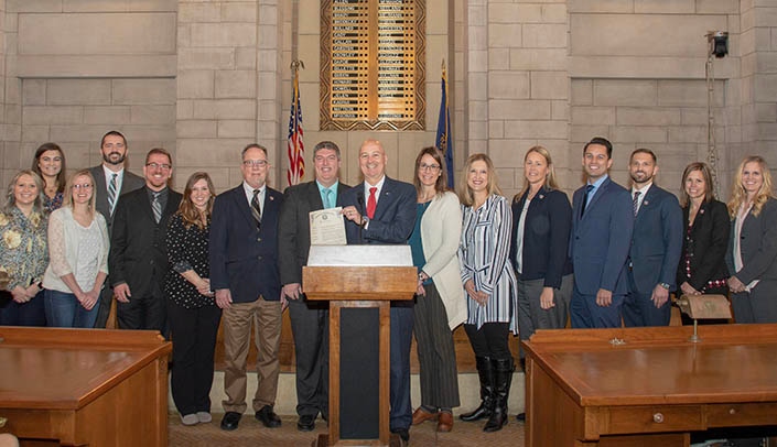 Members of UNMC's physician assistant program join with Gov. Pete Ricketts to mark PA Week with proclamation. Shaun Horak, interim director of the UNMC PA program, is located to the immediate left of the governor.