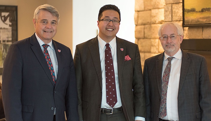 From left, Nebraska Medicine CEO James Linder, M.D., Howard Liu, M.D., chair of the department of psychiatry, and Bradley Britigan, M.D., dean of the UNMC College of Medicine.