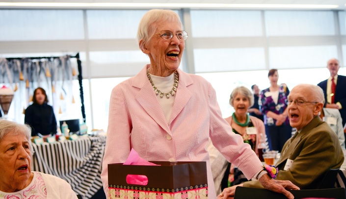 Virginia Grissom celebrates her 95th birthday with friends at UNMC's EngAge Wellness Center.