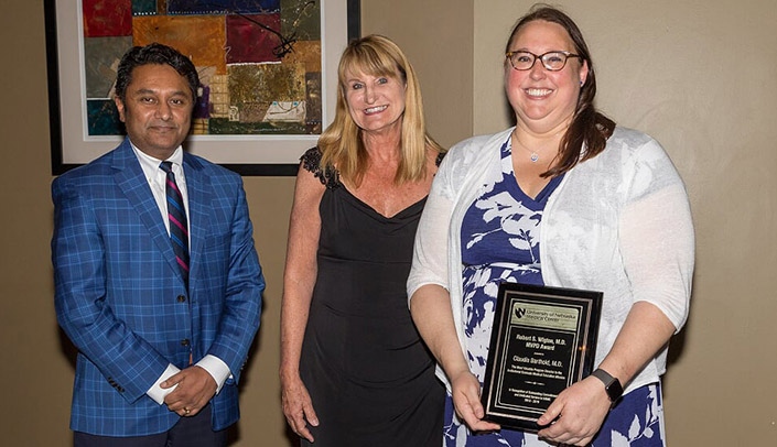 From left, Chandra Are, M.B.B.S., Vicki Hamm and Claudia Barthold, M.D., at the Emergency Medicine Residency Graduation and Alumni Dinner in June.