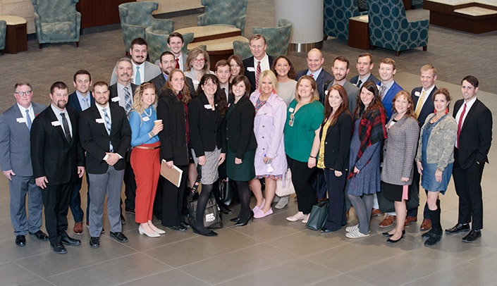 Nebraska LEAD Fellows pose for a photo before starting their tour of UNMC.
