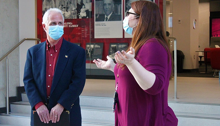 Carrie Meyer, head of special collections and archives with McGoogan Health Sciences Library, led Douglas County Commissioner Mike Friend on a tour of the Wigton Heritage Center during the commissioner's Jan. 6 visit to UNMC.
