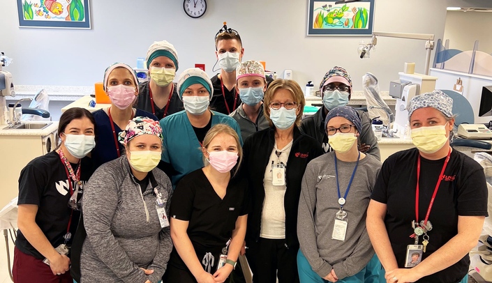 College of Dentistry dental students, pediatric dentistry residents, faculty and staff at a Children's Dental Day.
