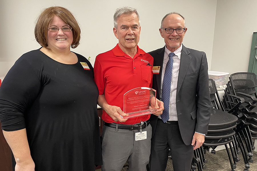 From left&comma; UNMC Family Medicine Medical Student Clerkship Director Mindy Lacey&comma; MD&comma; Timothy Blecha&comma; MD&comma; and UNMC Family Medicine Chair Jeffrey Harrison&comma; MD