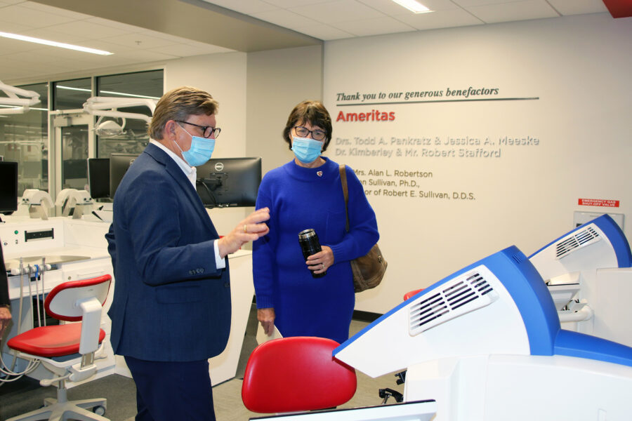 Suzanne Houlden&comma; fiscal analyst for the Nebraska Legislature&comma;  tours the UNMC College of Dentistry&apos;s clinical and virtual simulation lab with Merlyn Vogt&comma; DDS&comma; associate dean for student affairs&comma; admissions and external relations&period;