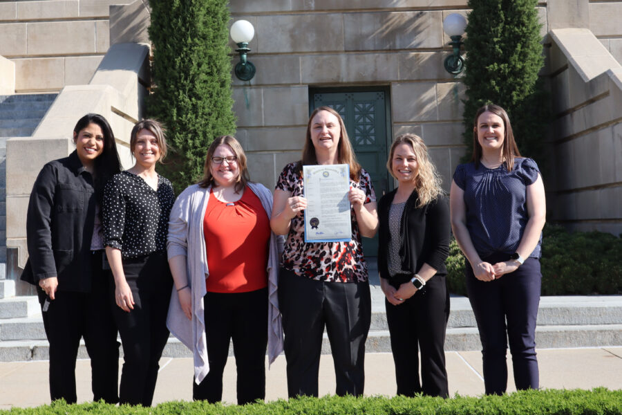 A group from MMI poses for a photo in front of the Nebraska State Capitol after Gov&period; Jim Pillen signed a proclamation declaring May as Pediatric Feeding Disorder Awareness Month&period; From left&comma; Angelica Ibarra&semi; Amy Volkman&semi; Tara Baker&semi; Amy Drayton&comma; PhD&semi; Rachel Knight&comma; PhD&semi; and Jenn Kozisek&period;