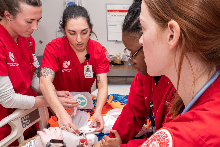 Merissa Roth&comma; Maya Buss&comma; Jenika Jennings&comma; and Mary Graff&comma; all UNMC College of Nursing students in the NRSG 419-Transition to Practice course&comma; work through a code simulation at Children’s Hospital and Medical Center&period;