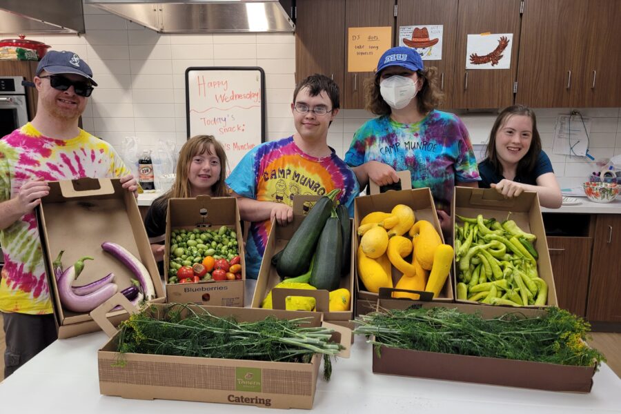 Members of the MMI Garden Club show off a recent harvest&period;
