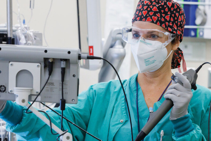 Amy Duhachek-Stapelman&comma; MD&period; vice chair of education for the UNMC Department of Anesthesiology&comma; work in the operating room at the Hixson-Lied Center&period;