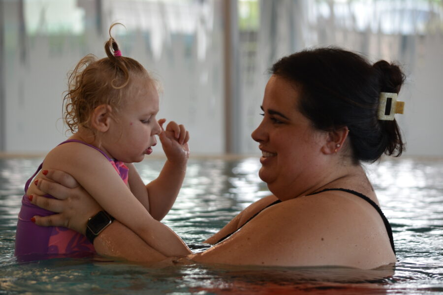 Maddison Bull&comma; left&comma; works with Sam Montemarano during an occupational therapy session in the pool&period;