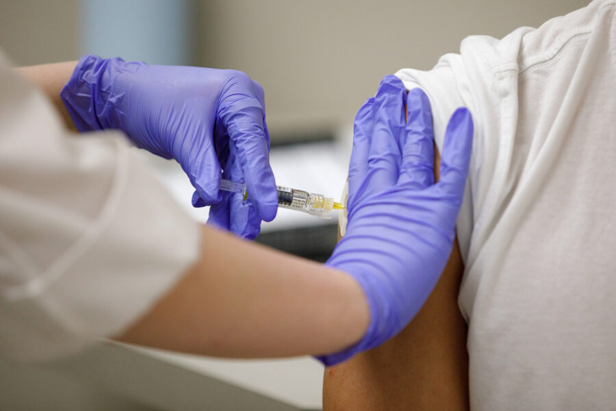 A patient receives a flu shot