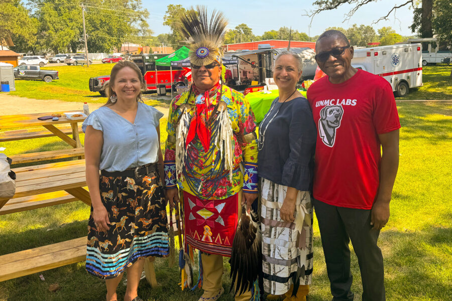 From left&comma; Lisa Spellman&comma; tribal leader Dustin Lovejoy&comma; Siobhan Wescott&comma; MD&comma; and UNMC Interim Chancellor Dele Davies&comma; MD