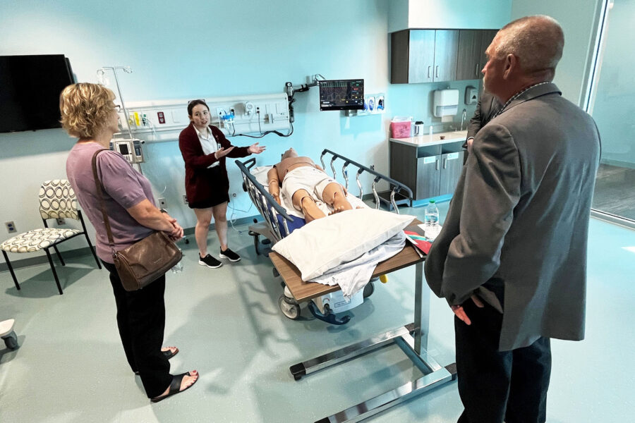 Legislative candidate Dave Wordekemper &lpar;at right&rpar;&comma; with his wife Barb&comma; listen to a presentation by iEXCEL&apos;s Moriah McCune about a high-tech health care simulation manikin&period;