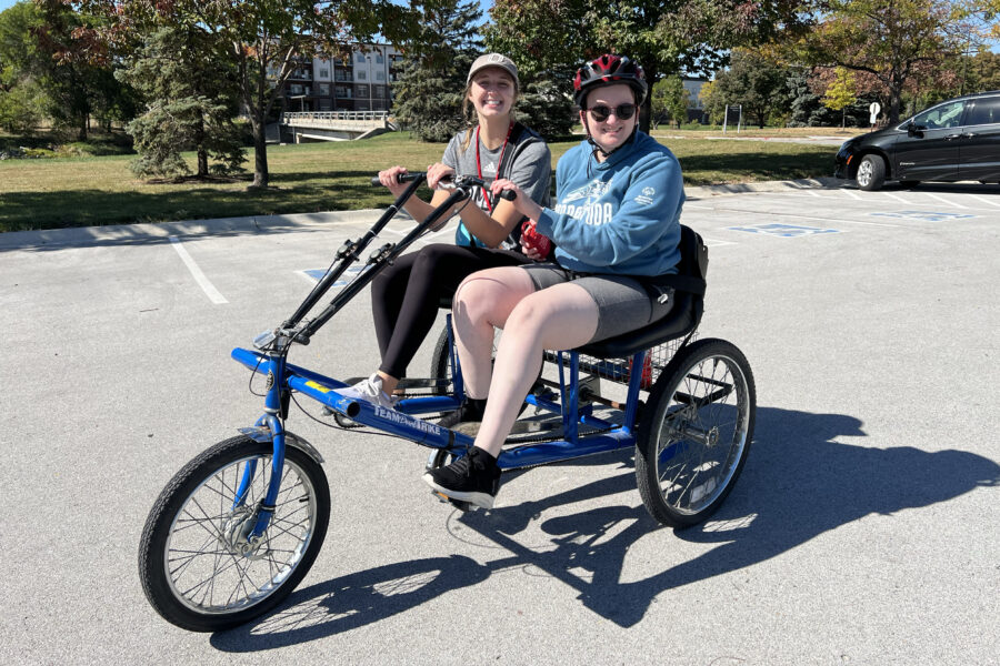 Talisa Stumpf&comma; right&comma; rides with Gracie Streblow during a Wheel Club session&period;