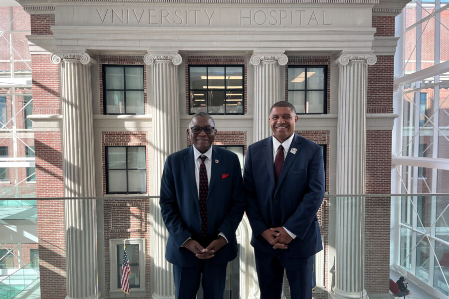 UNMC Interim Chancellor H&period; Dele Davies&comma; MD&comma; and Chadron State College President Ron K&period; Patterson&comma; EdD&comma; at the balcony overlooking the Wigton Heritage Center