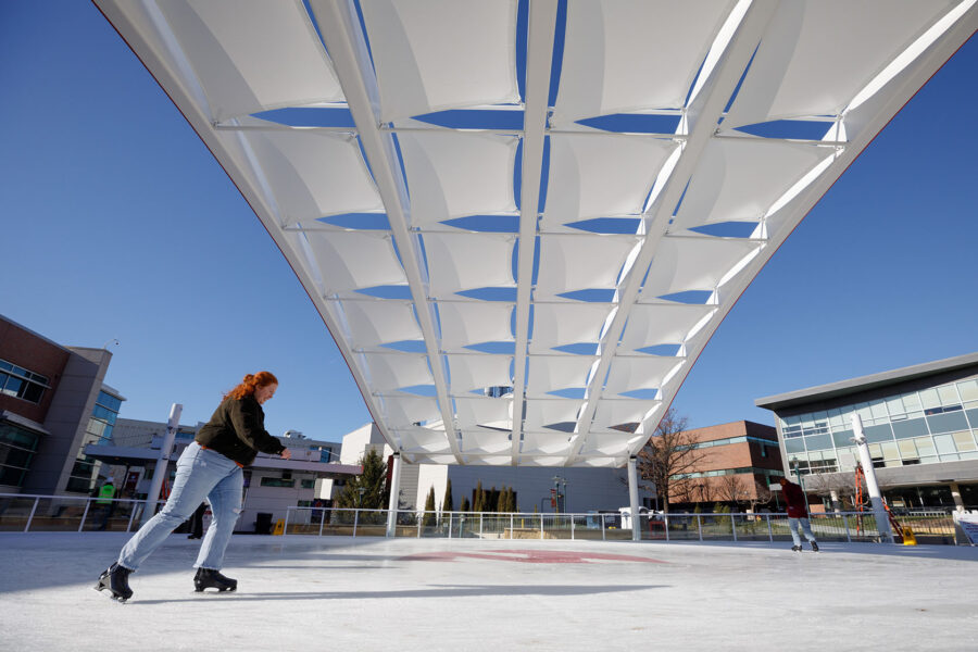 A skater on the ice at the UNMC Ice Rink