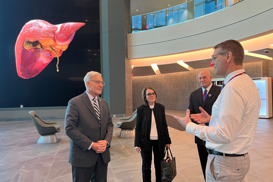 From left&comma; Nebraska Secretary of State Bob Evnen and Deputy Secretary of State Cindi Allen tour the Davis Global Center with DJ Thayer&comma; of the UNMC Office of Global Engagement&comma; and Benjamin Stobbe&comma; assistant vice chancellor for advanced and statewide simulation&comma; iEXCEL&period;