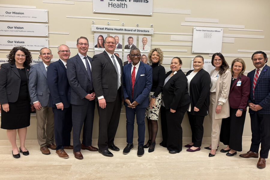 On their trip to Central Nebraska&comma; UNMC leaders met with leaders of Great Plains Health in North Platte&period; From left are&colon; Faye Haggar&comma; EdD&comma; manager&comma; Center for Community-based Education & Preceptor Excellence&semi; Rob Messbarger&comma; MD&comma; associate dean for the UNMC College of Medicine’s regional medical school campus&semi; Brandon Kelliher&comma; chief information officer for Great Plains Health&semi; Kyle Meyer&comma; PhD&comma; interim assistant vice chancellor for health care workforce education and relations and dean of the UNMC College of Allied Health Professions&semi; Ivan Mitchell&comma; chief executive officer for Great Plains Health&semi; UNMC Interim Chancellor H&period; Dele Davies&comma; MD&semi; Danelle Franzen&comma; chief operating officer for Great Plains Health&semi; Tina Pate&comma; chief nursing officer&semi; Summer Owen&comma; chief financial officer&semi; Misti Hutchinson&comma; chief provider network officer&semi; Barb Petersen&comma; chief quality officer&semi; and Chandra Are&comma; MBBS&comma; associate dean for graduate medical education&comma; UNMC College of Medicine&period; &lpar;Courtesy Faye Haggar&comma; EdD&rpar;