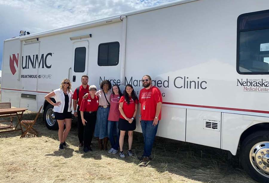 Dean and staff with Mobile Unit