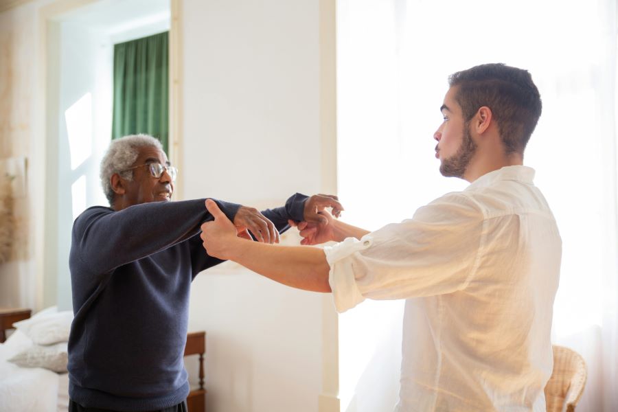 A nurse works with a patient.