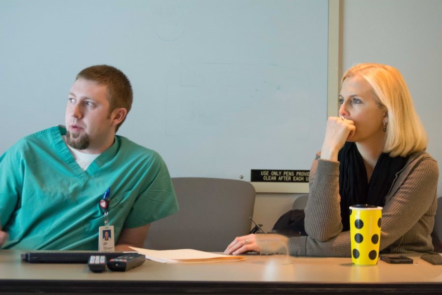 Staff members in a conference room