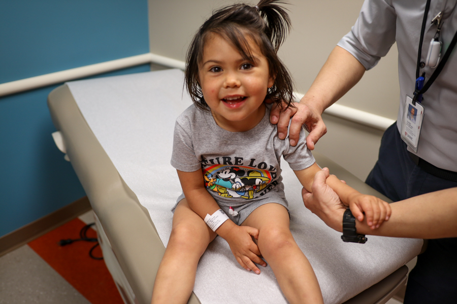 child smiling during medical examination