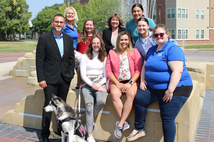 people posing on campus of UNMC