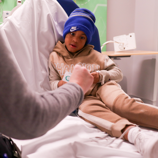 Patient receiving sticker from doctor