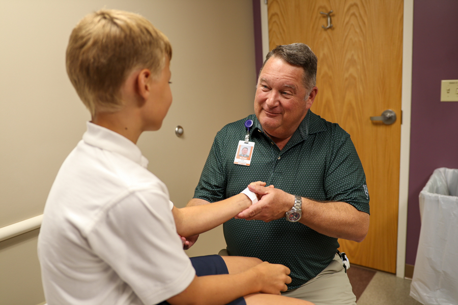 Physician examining a patient