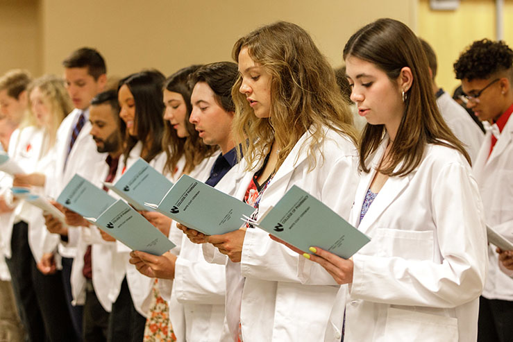 Students reciting the pledge of professionalism