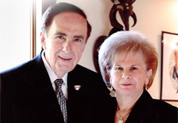 A photo of Dr. Harold M. and Beverly Maurer standing side by side.
