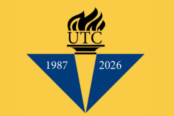 UTC logo: fire with two triangles underneath and the years 1987 and 2023.