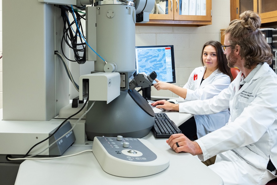 Electron Microscopy team members working within the core facility.