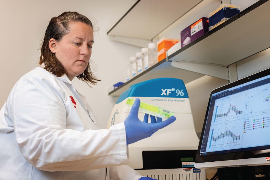 Dr. Stauch analyzes results from the Agilent Seahorse Extracellular Flux Analyzer.