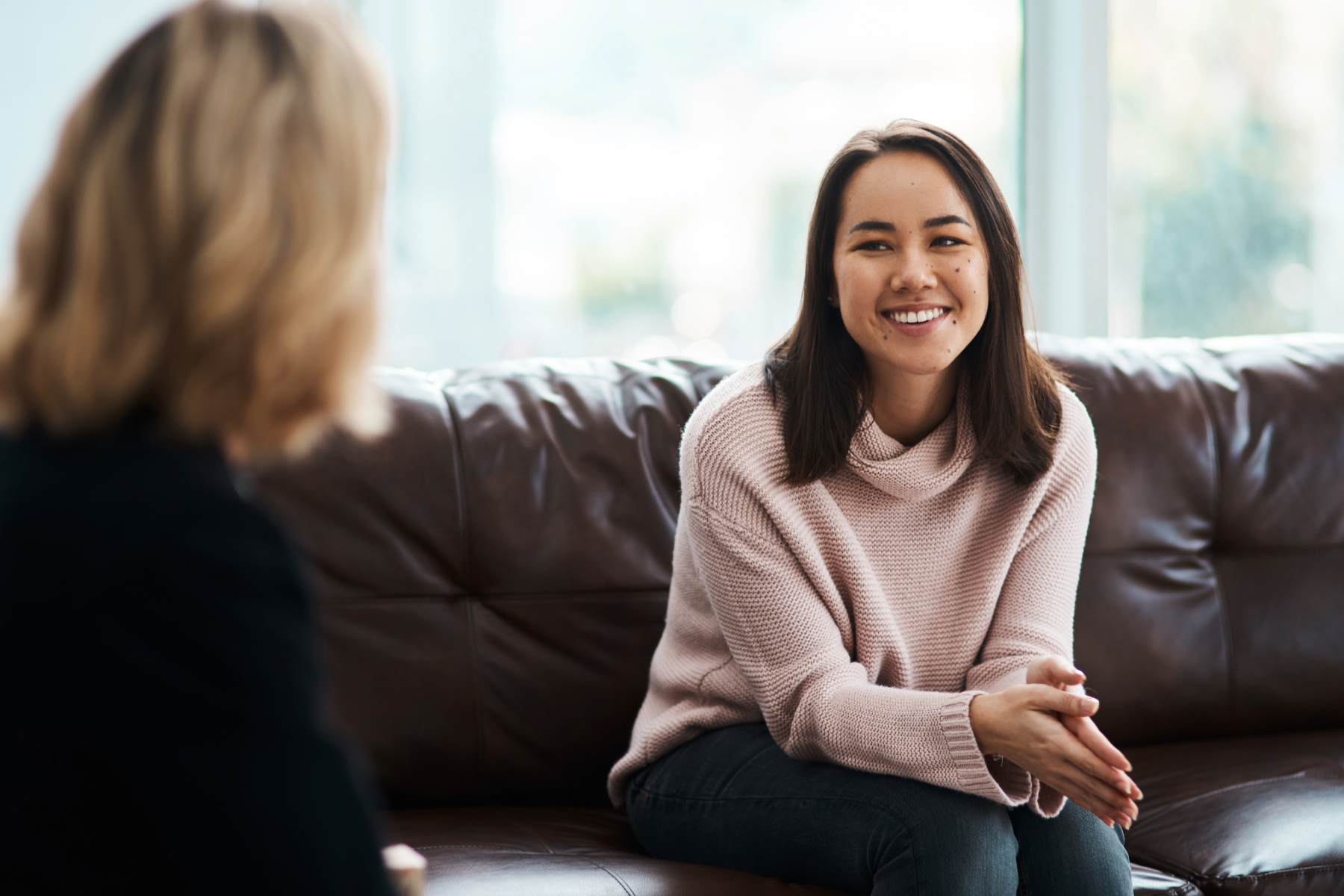 female student talking with a counselor